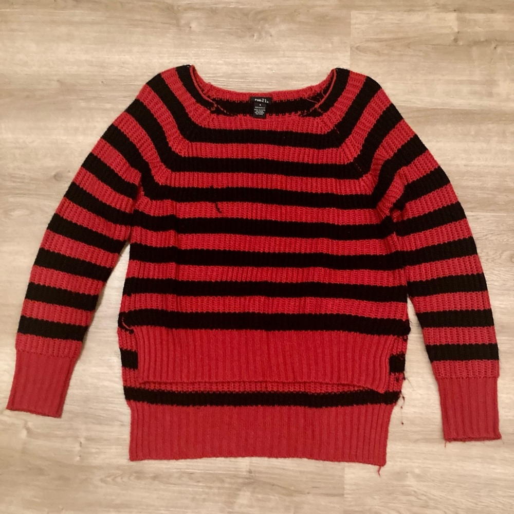 Red and black striped sweater.